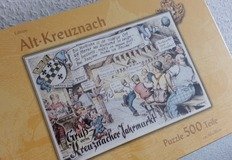 Papp-Box mit Bad-Kreuznach-Puzzle, Motiv Kreuznacher Jahrmarkt