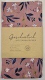 Geschirrtuch, dunkelrosa Hintergrund mit weißen Blüten und blauen Blättern